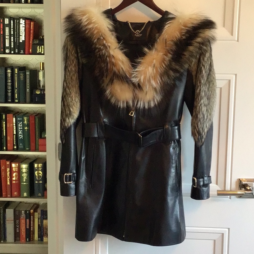 Lamb leather, fox, and wolf hooded coat.